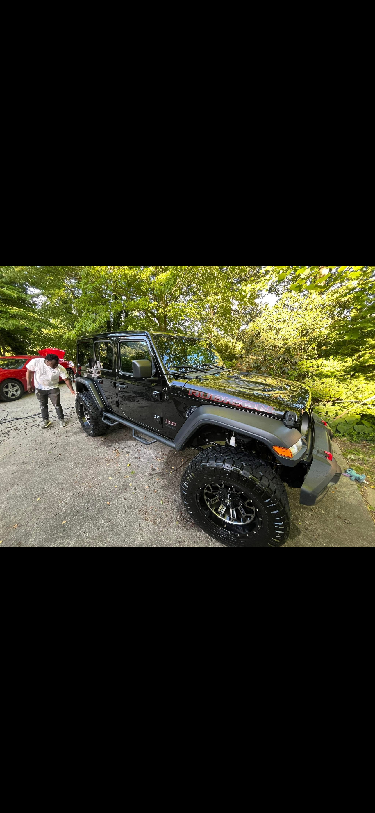 Detailed black Jeep Wrangler - front view