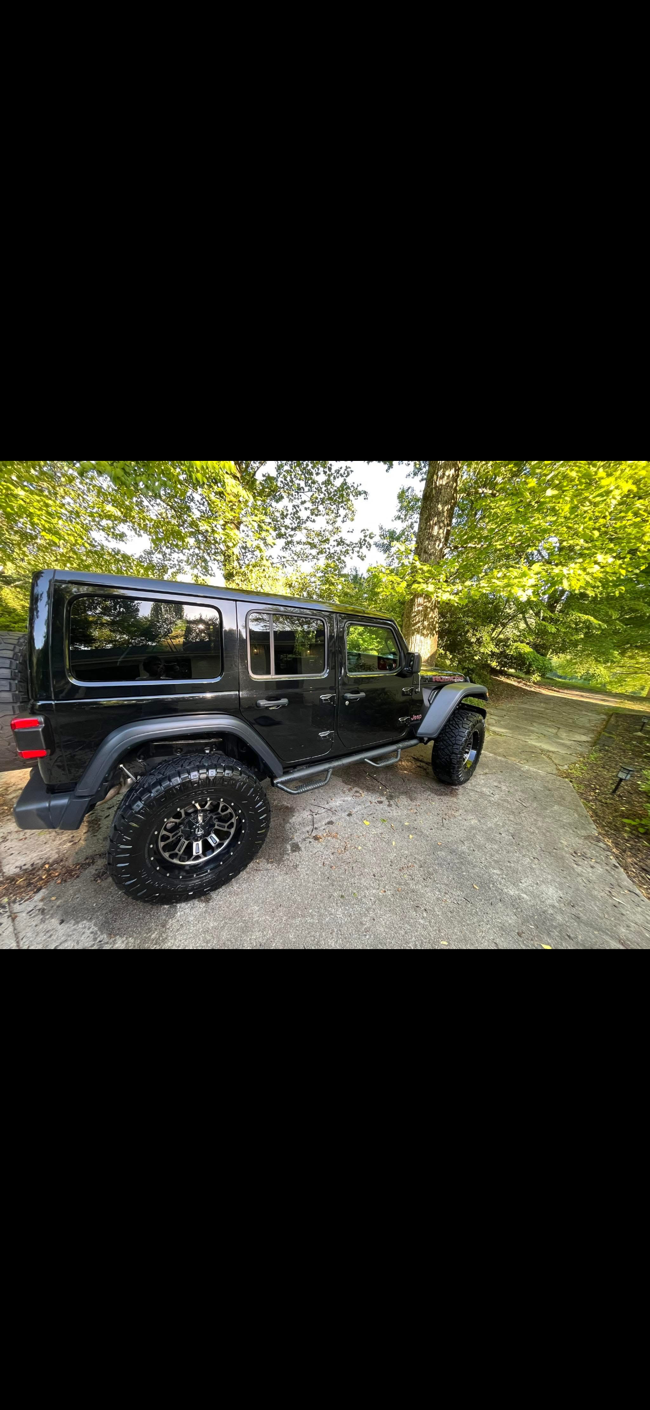 Detailed black Jeep Wrangler - rear view